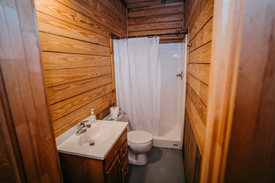 Private bathroom and shower stall in a cabin on the Ocoee River